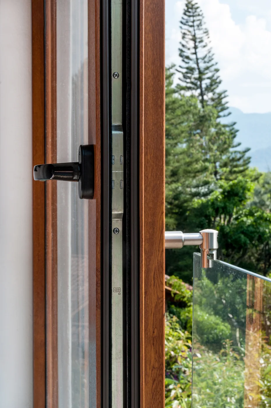 Picture window framing an exterior view from inside a home