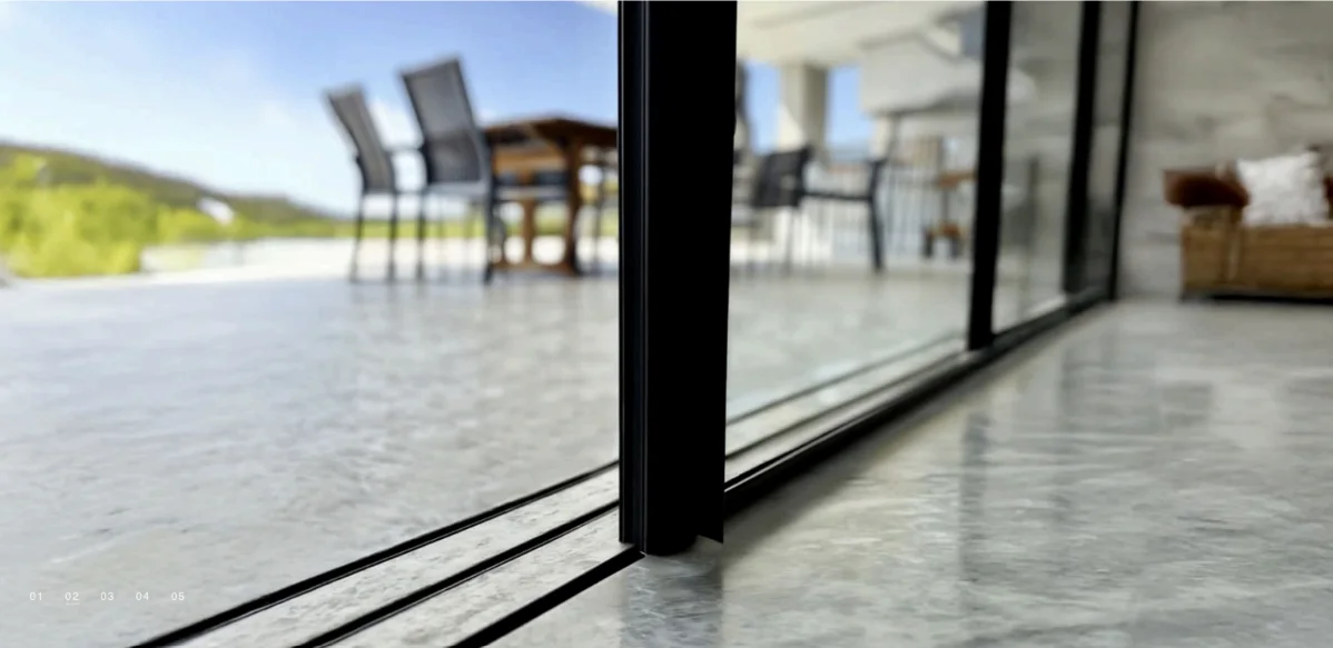 Recessed Vista sliding-door threshold and slim interlock detail