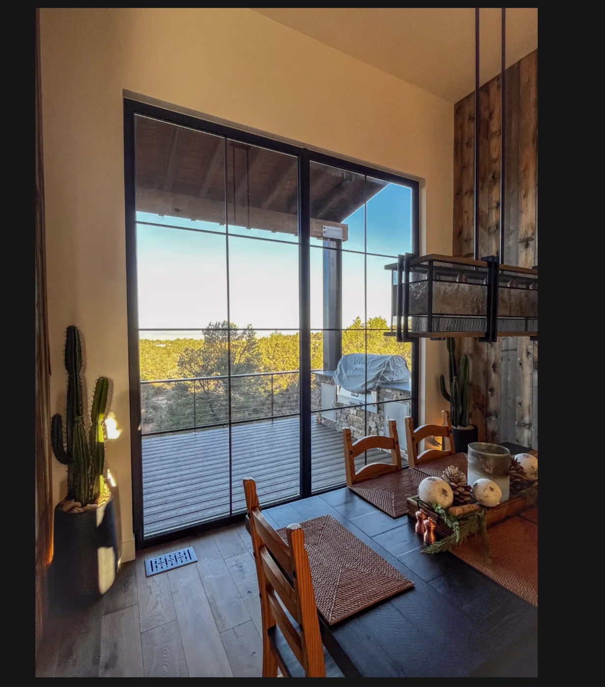 Prescott home entry with windows looking toward the surrounding trees