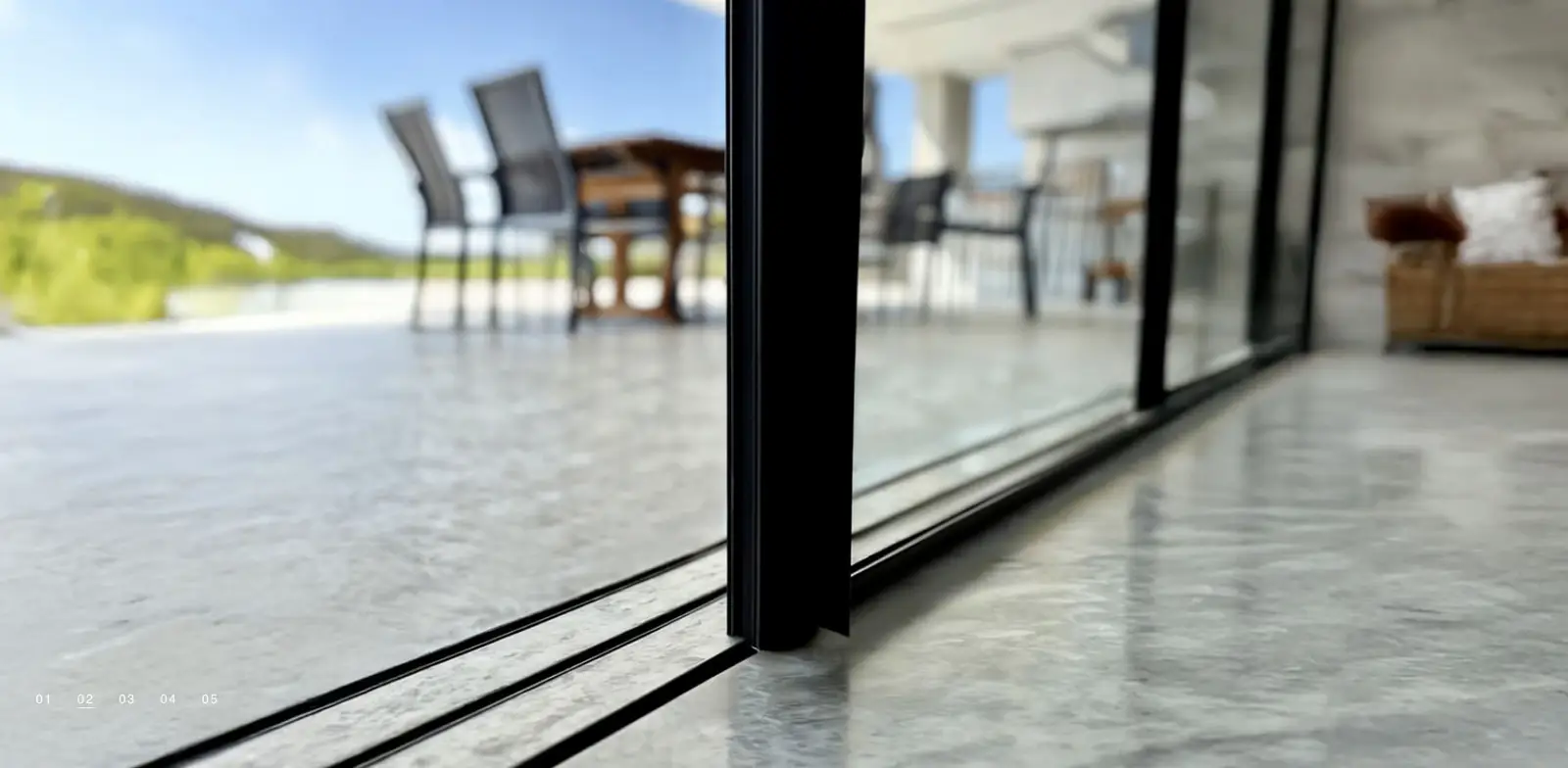 Slim threshold detail — the track integrates flush with the floor